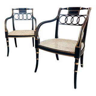Pair of Baker Furniture “Governor Alston” Regency Black & Gilt Caned Armchairs For Sale