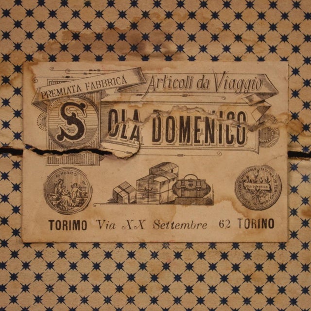 Italian travel trunk from the mid-20th century. Wooden furniture with iron decorations, complete with side handles,...