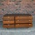 Newly refinished pair of Harvey Probber dresser in walnut. This piece comes with brass accents on the legs and all six...