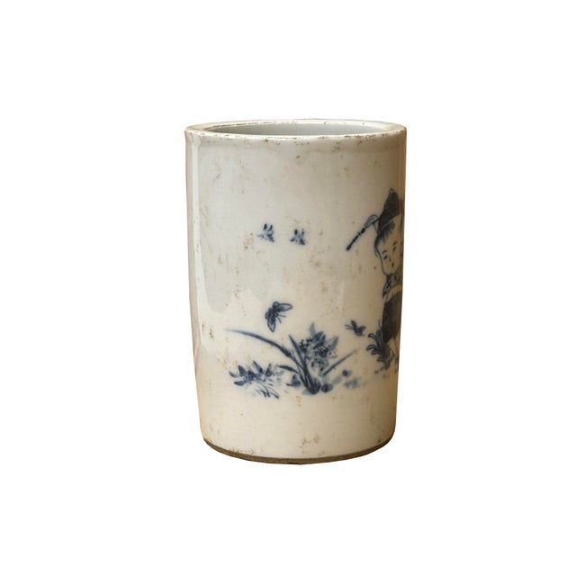 This vintage style Chinese blue and white porcelain brush pot (Bitong) showcases the refined artistry of the Republic...