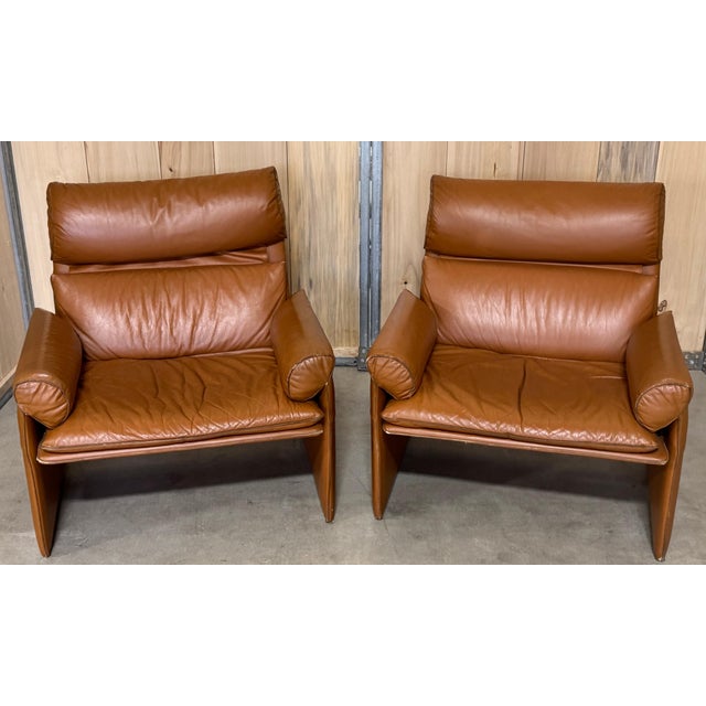 Pair of Saddle Brown Leather Lounge Chairs by Giovanni Offredi for Saporiti, Italy, 1970s This beautiful pair of saddle...