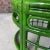 Dorothy Draper Mid-Century Bespoke Green Rattan Smoked Glass Side Table - Newly Painted For Sale - Image 4 of 12