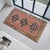 Add a touch of authentic Anatolian charm to your home with this exquisite vintage Oushak mat. Featuring beautifully aged...