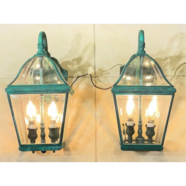 pair of vintage solid brass lanterns exudes timeless elegance and old-world charm. Crafted from , high-quality solid...