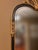 Ornate Gold and Black Beveled Wall Mirror With Botanical Crest For Sale - Image 4 of 6