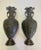 Japanese Meiji Period Bronze Vases with Elephant Head Handles. Vases have a chased finish with raised decoration of tree...