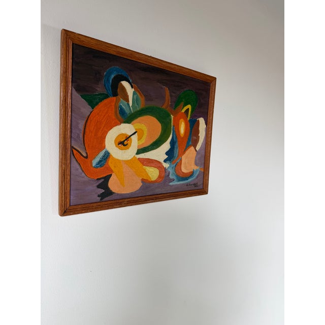 A striking 1975 abstract still life oil painting on canvas board, signed and dated “E. Hanniferd 1975” in the lower right....