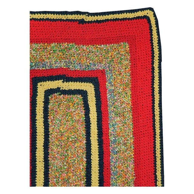 A vintage American Rag rug in throw/scatter size handmade during the mid-20th century. Measures: 3' 3" x 6' 5".