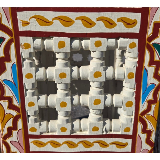 Beautiful Moroccan-style accent table or stool featuring a striking hexagonal design and hand-painted decorative details...