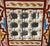 Beautiful Moroccan-style accent table or stool featuring a striking hexagonal design and hand-painted decorative details...