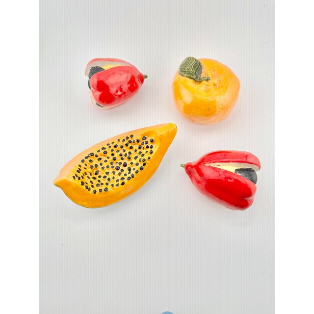 Wonderful set of vintage ceramic fruit. Hand made. Perfect to add to a bowl for display. These are pre-owned items so...