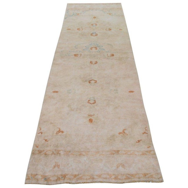 Hand-knotted with care using traditional rug-making techniques, this wool rug blends timeless craftsmanship with a modern...