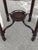 Elevate your home with the timeless elegance of this Early 20th Century Mahogany Round Parlour Table. This exquisite two-...