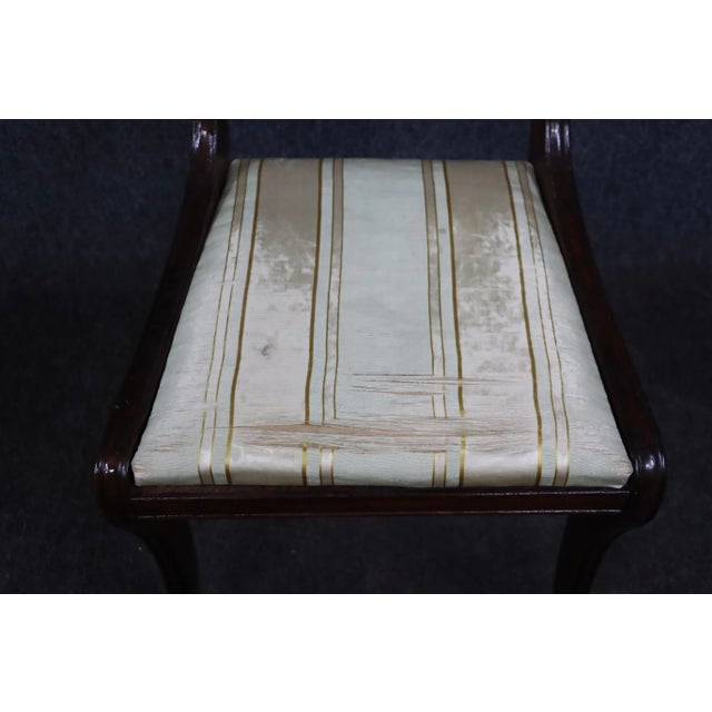 Federal style side chair in mahogany with carved eagle accent.