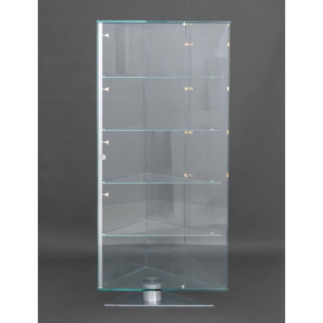 Modern Metal and Glass Illuminated Display Shelf, with halogen spotlights. 76" H x 35" W x 21" D. Provenance: From a 45...