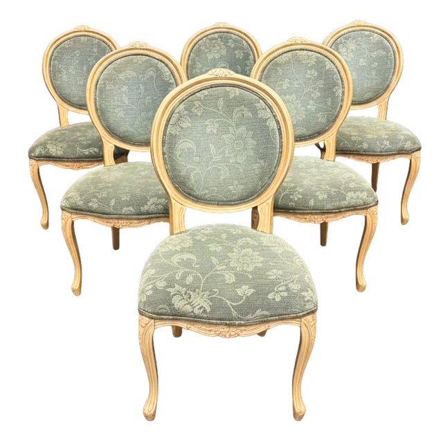 There is something effortlessly romantic about this beautiful French seating set. with their medallion backs, softly...