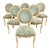 There is something effortlessly romantic about this beautiful French seating set. with their medallion backs, softly...