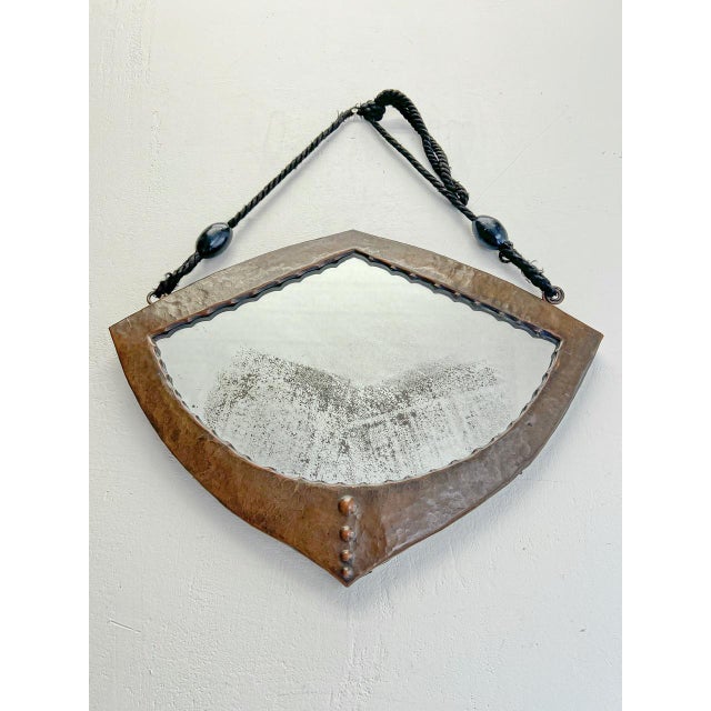 This Arts & Crafts antique with its original thick glass mirror is an absolutely characterful old item from around 1900,...