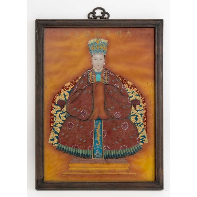 Pair of Chinese Ancestor Portraits Reverse Glass Paintings, with painted character inscription to the top center, wood...