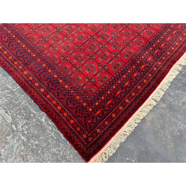 This beautiful 100% wool hand-knotted Afghan MorGul Turkmen Pattern rug is a vintage piece, Handmade by Afghan Turkmen...