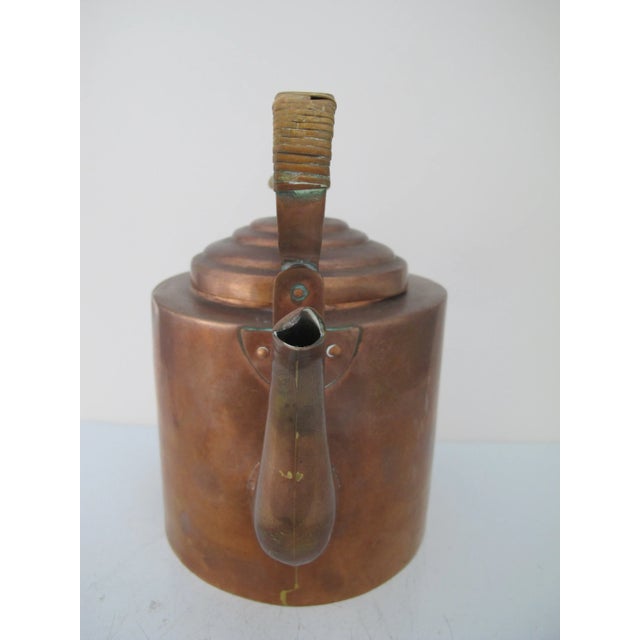 Chinese copper tea kettle with lid. Measures 8.25" tall including handle x 8.5" x 5". Excellent condition, light ding at...