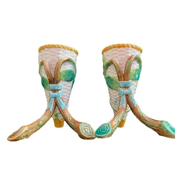 Pair of George Jones Majolica Cornucopia Vases, English, circa 1875, each modeled as a white wicker ground cornucopia,...