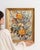 This 1970s painting from France is an oil on panel, housed in a wood frame. It is distinguished by its flowers by landel,...