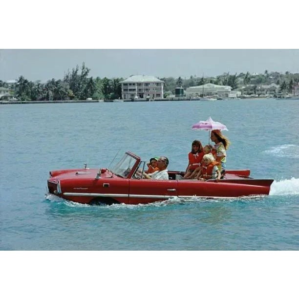 Sea Drive 1967 1967. Film producer Kevin McClory takes his wife Bobo Sigrist and their family for a drive in an ‘Amphicar’...