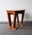 Set of 3 vintage nesting tables in solid wood, with a simple and elegant scandinavian design. Their tapered legs with a...
