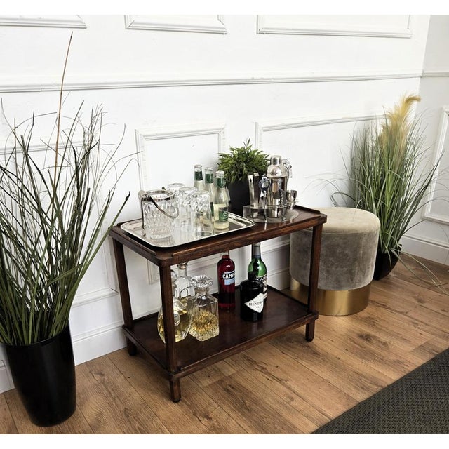 Very elegant Italian dry bar side table in typical Mid-Century Art Deco shape and materials with its beautiful wood and...