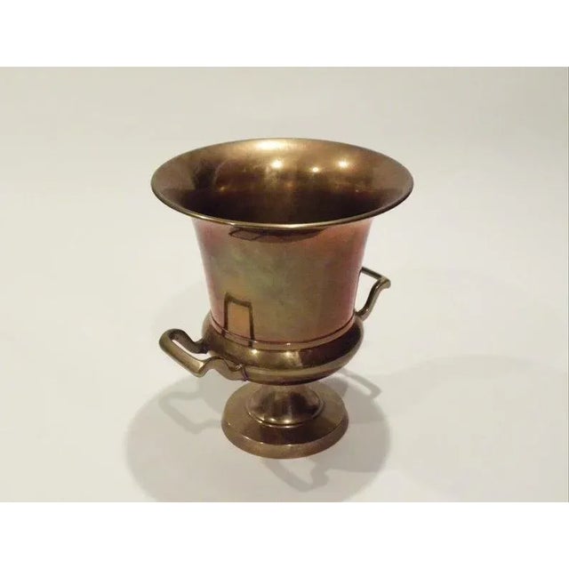 Vintage Mid Century Brass Loving Cup Ice Bucket Appears to be brass construction in a classic loving cup design. Heavy and...