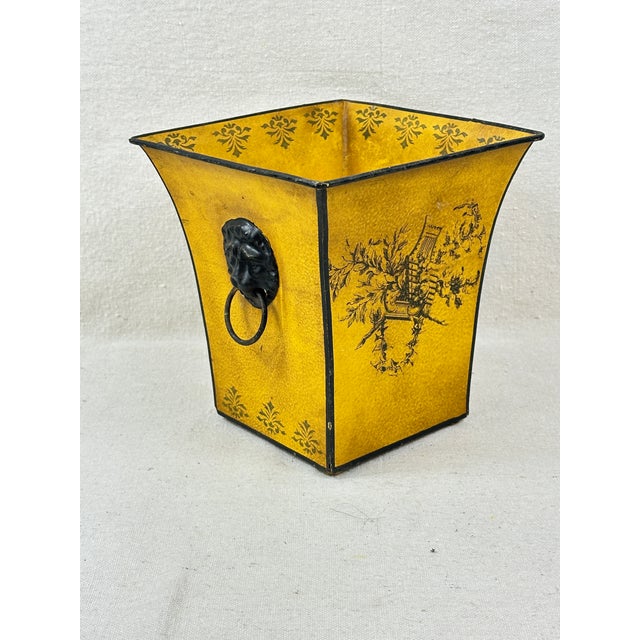 Vintage yellow toleware planter with lion head rings. This is a pre-owned item so please see all pictures and ask any...