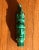A hand-carved malachite sculpture depicting an indigenous tribesman - possibly Mayan or Aztec - , probably 20th century. A...