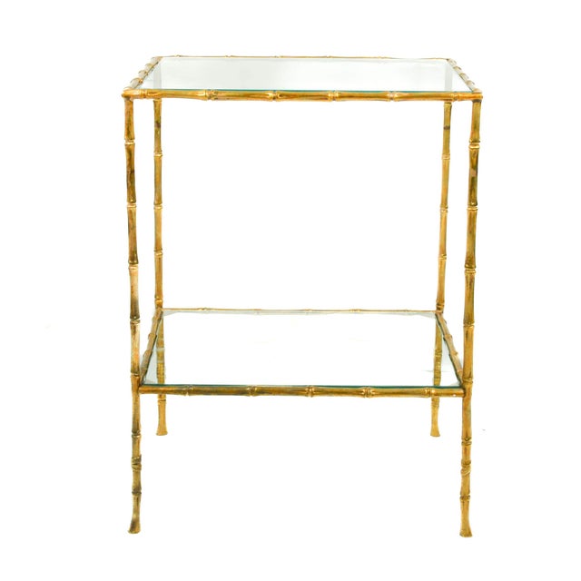 This Metal Bamboo-Style Side Table brings a chic blend of organic style and structural elegance to any space. Crafted to...