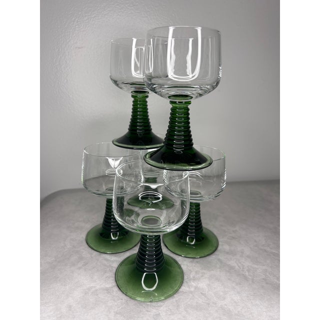 Step into a mid-century German forest with this charming set of six “beehive” stem wine glasses in a rare, deep green hue....