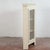 This small corner display cabinet is a charming example of vintage furniture, ideal for those who appreciate the appeal of...