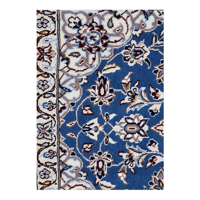 Beautiful hand-knotted Nain rug made from wool and silk. Nain is a small village located in central region that has...