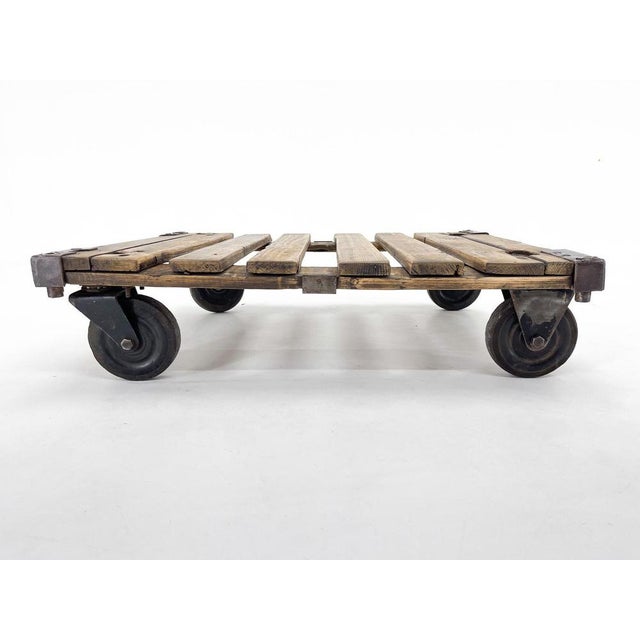 Vintage industrial palette that can be used as a coffee or side table.