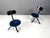 Pair of tripod foldable bar stools by Calligaris made from black lacquered wooden bases and blue velvet upholstery 1990s -...