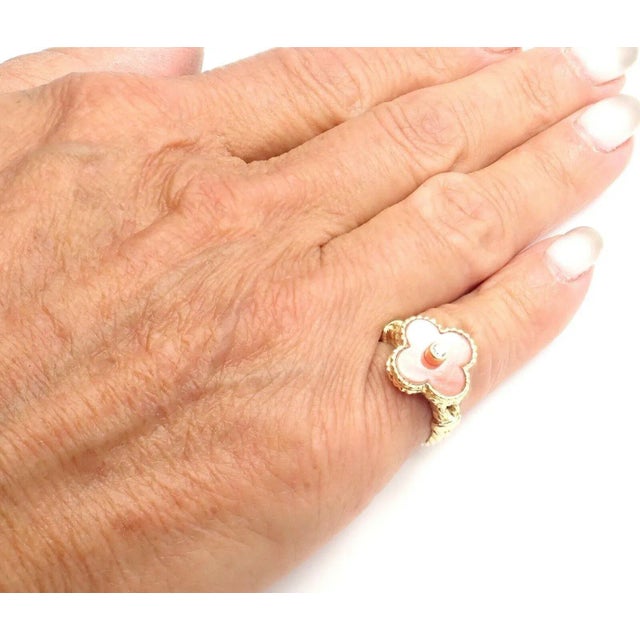 About This Piece: Metal: 18k yellow gold Size: 4 3/4 (Resize Available) Width: 14mm Weight: 4.9 grams Stones: 1 alhambra...