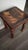This is a dense, solid hardwood type of Thakat side table. Its appearance is rustic featuring a hand-carved, geometric...