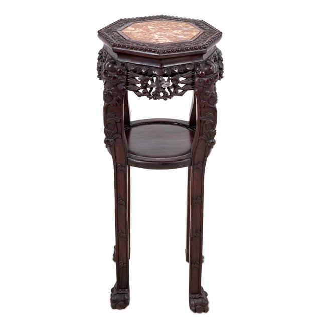 Chinese Carved Hardwood and Marble Two Tier Pedestal Table, late 19th century, the octagonal top above tall legs with ball...