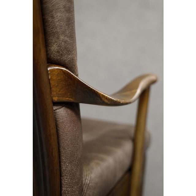 This high armchair was produced by the Danish manufactory Farstrup Møbler during the 1970s. The frame is made of solid...