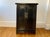 A Chinese small Ming style black lacquered cabinet chest (used traditionally for storing linens, clothing, and small...