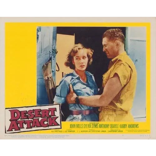 Original lobby card for the film "Desert Attack" (1958) featuring John Mills and Sylvia Syms. This vintage cinema...