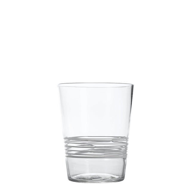 Handmade colored tumblers in mass-colored glass, blown in light shades with a spiral of "lattimo" glass threads applied...