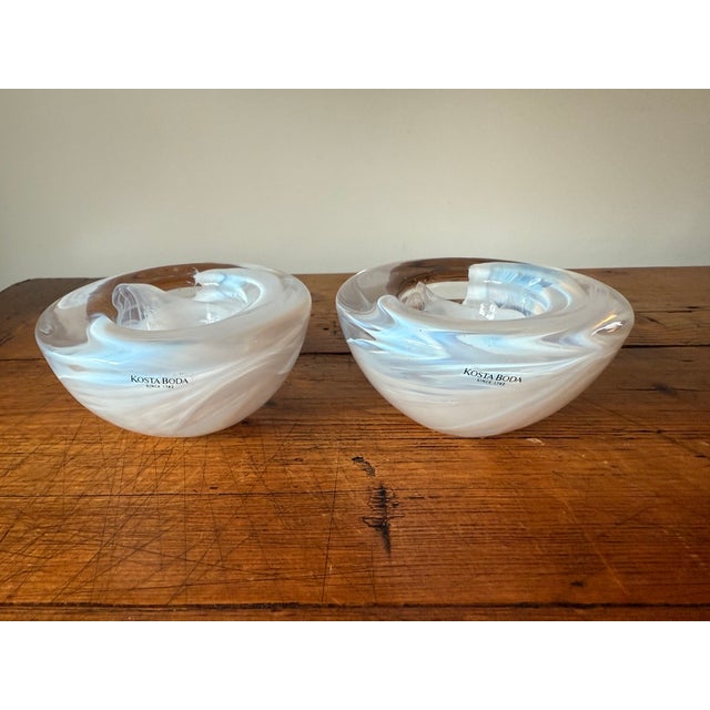 Pair of Kosta Boda White Swirl "Atoll" Votive Candle Holders designed by Anna Ehrner. Classic swedish design by Kosta Boda...