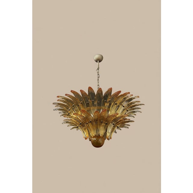 DUTIES FREE An exceptional and authentic Italian glass chandelier, handcrafted in Italy, using traditional Venetian...