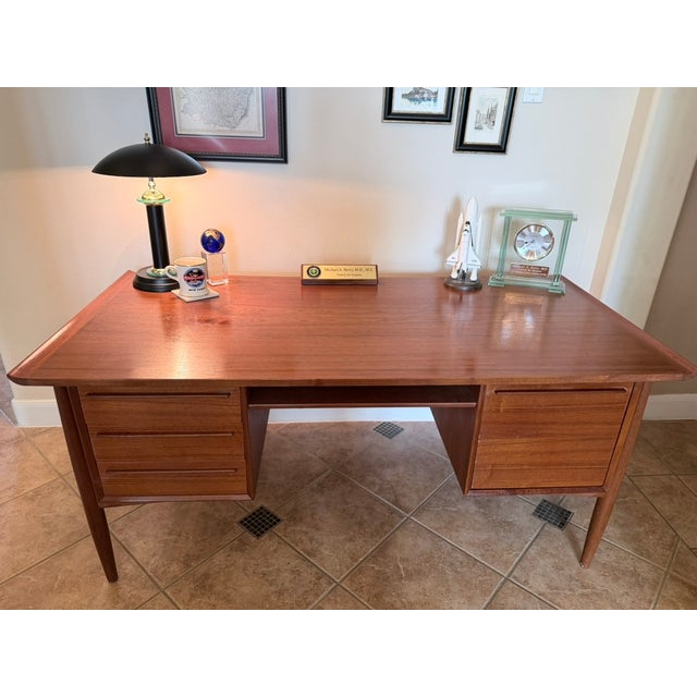 Authentic Svend Åge Madsen "Model 20" Floating-Top Teak Executive Desk for H.P. Hansen An exceptional and highly sought-...