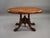 A very attractive Victorian oval occasional table, English, dating to the mid 19th century. The table is finely veneered...